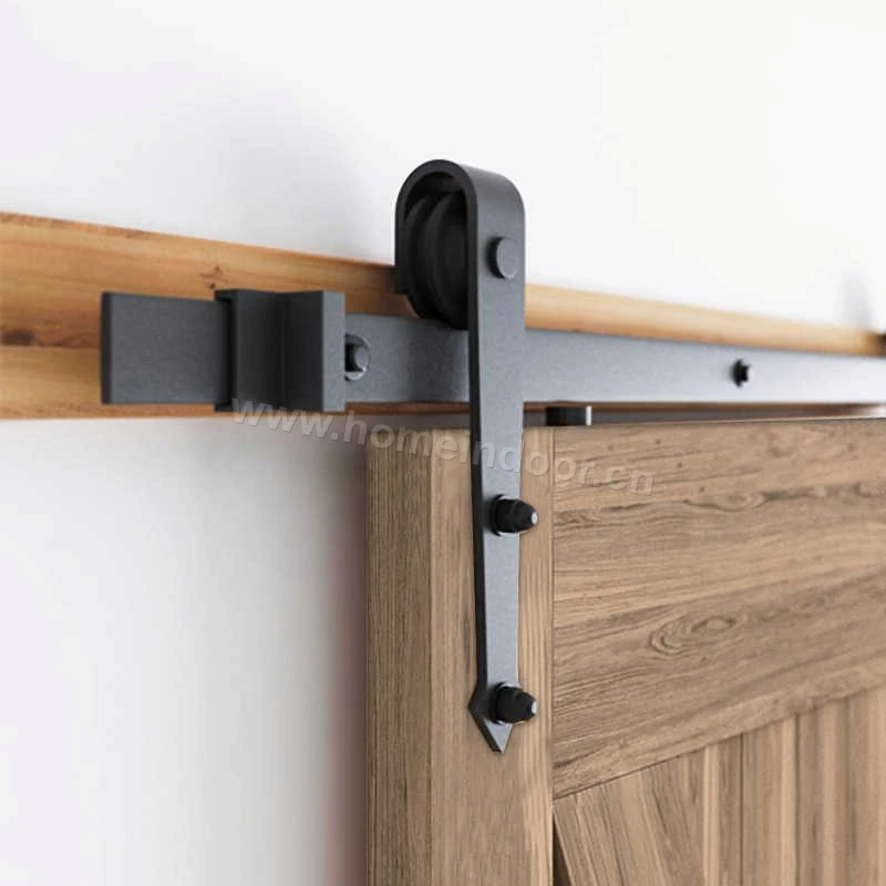 Black rustic wrought iron barn door rail system