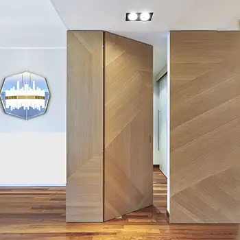 Minimalist floor to ceiling trimless wood door