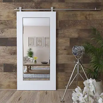 Interior white wood sliding barn door for bathroom with mirror